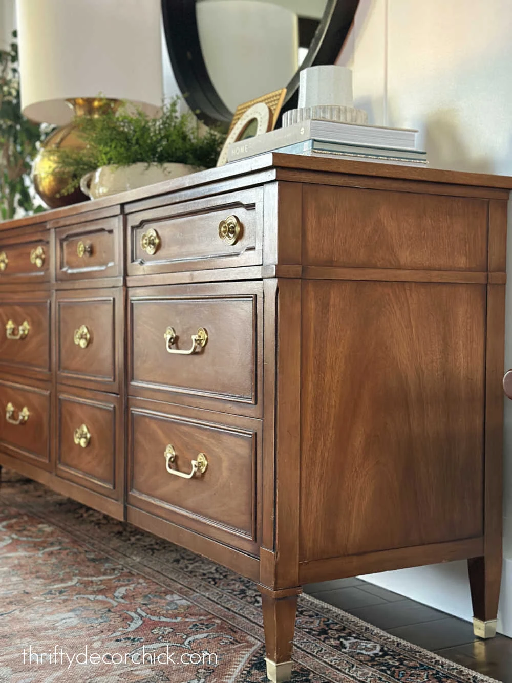 wood dresser with brass detail